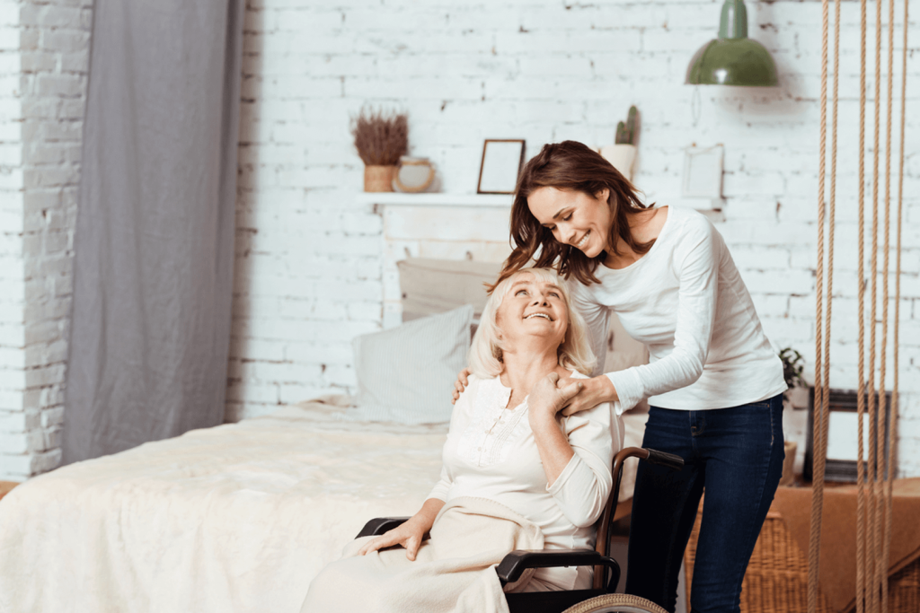 Caregiver providing companionship and support to an older adult at home