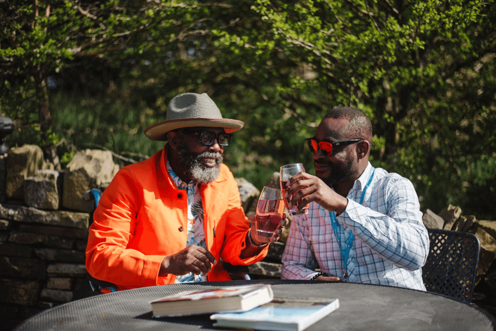 Caregiver and older adult sharing a conversation outdoors