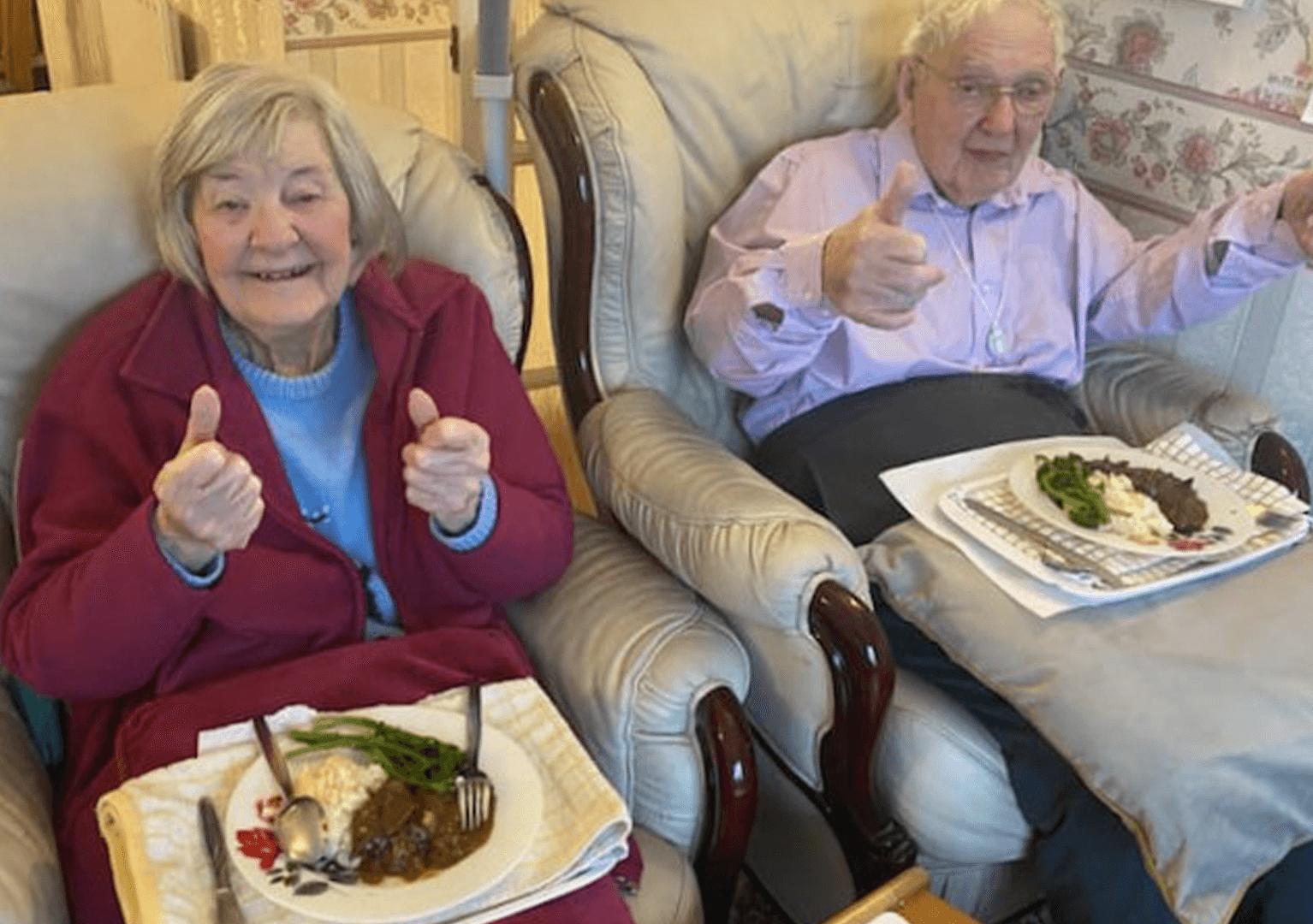 elderly couple having a meal