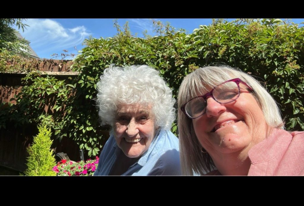Photo of a client receiving care from one of our Angels