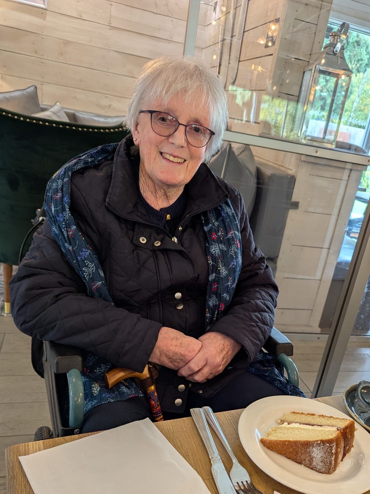 a person is sitting in the cafe