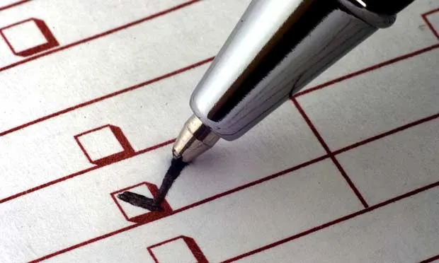 pen with checklist answering attendance allowance question