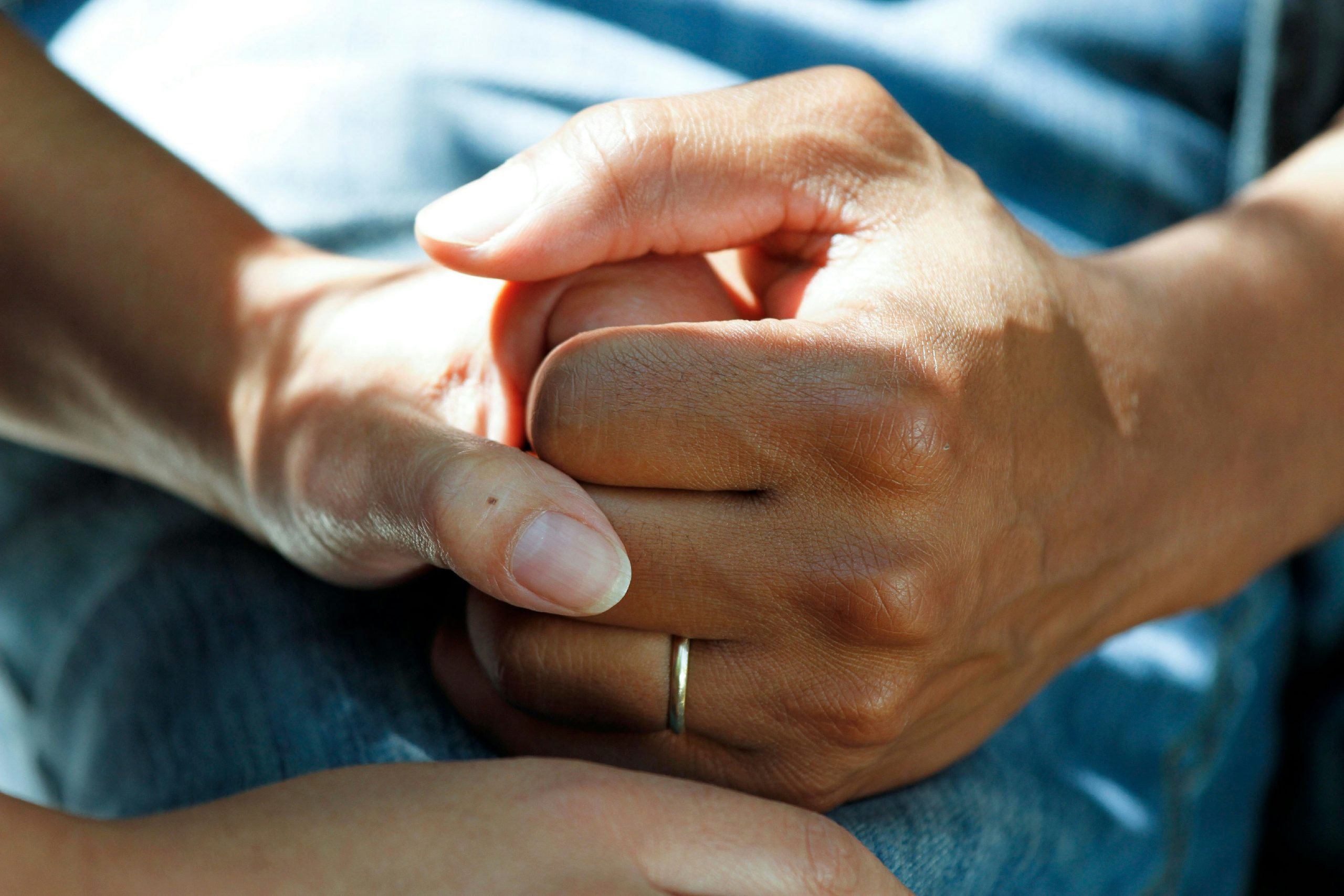 holding hands during care assessment