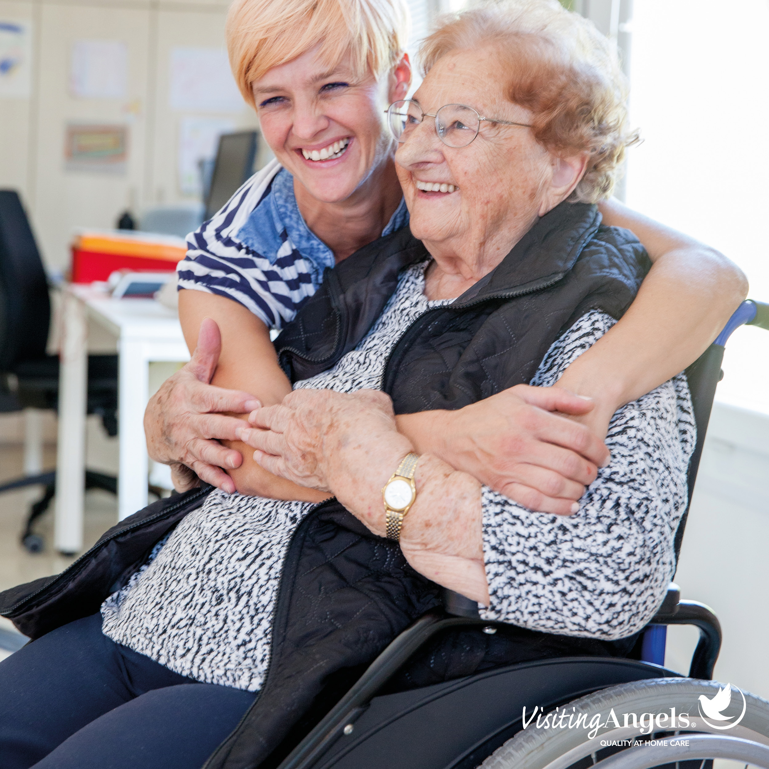 Caregiver with wheelchair bound elderly client