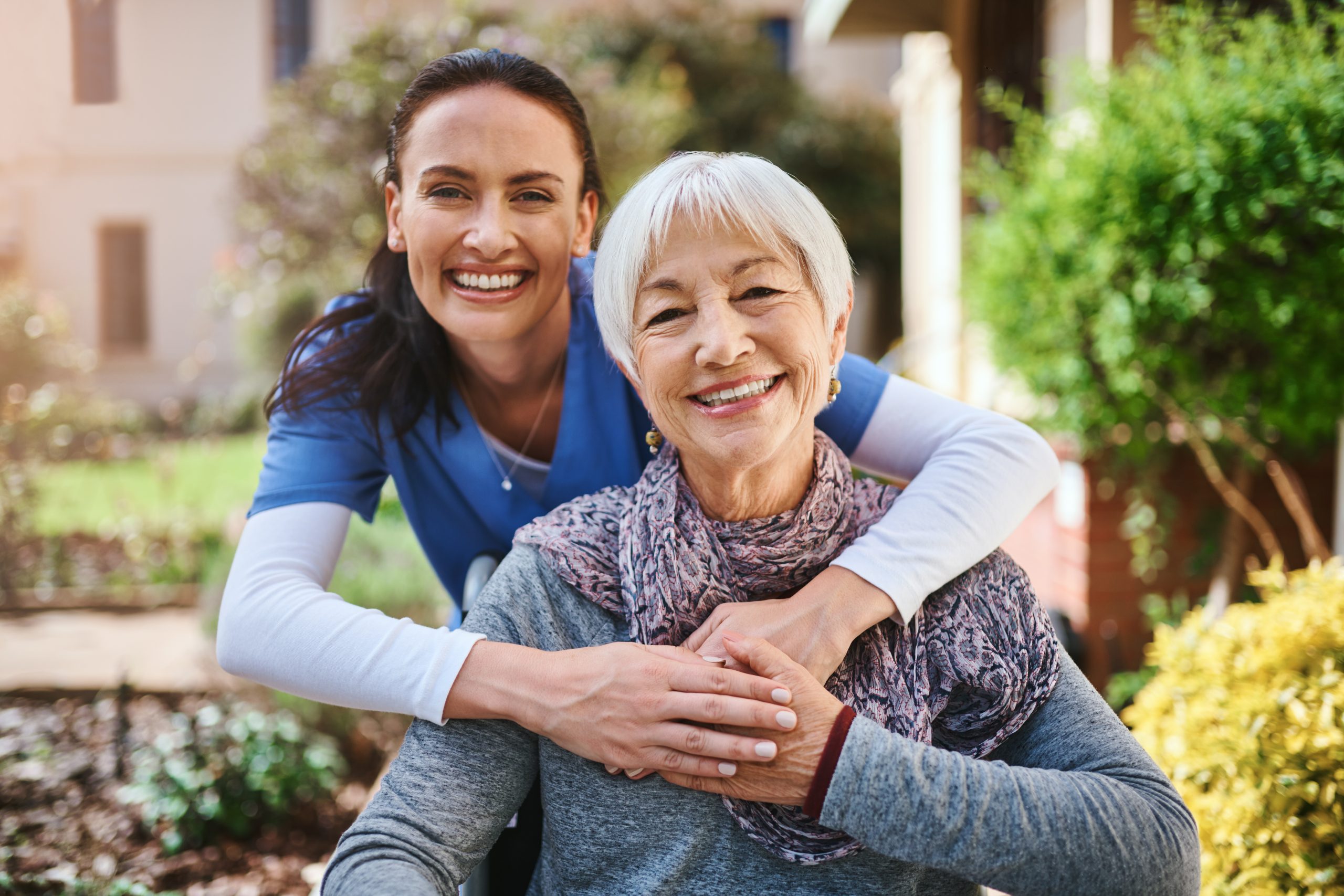 A trusted Visiting Angels carer delivering dignified personal care support to an elderly woman in her Middlesex home, maintaining her independence and comfort