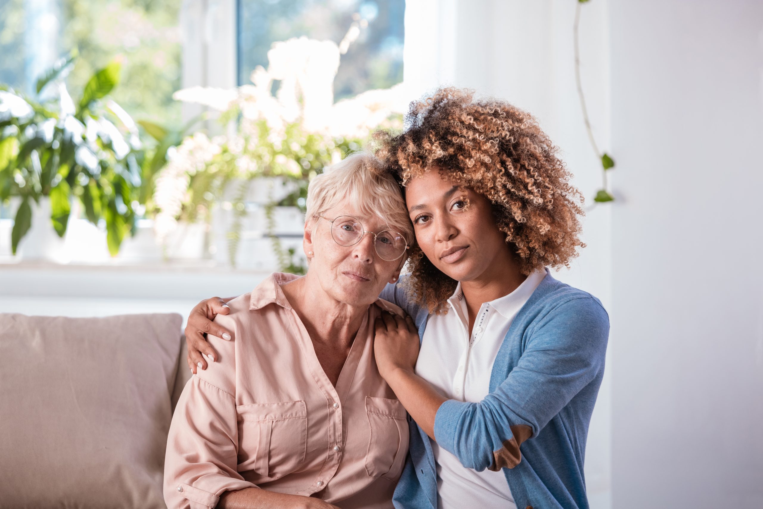 A trained Visiting Angels overnight carer providing attentive night-time support to an elderly person at home in Middlesex, ensuring safety and peace of mind