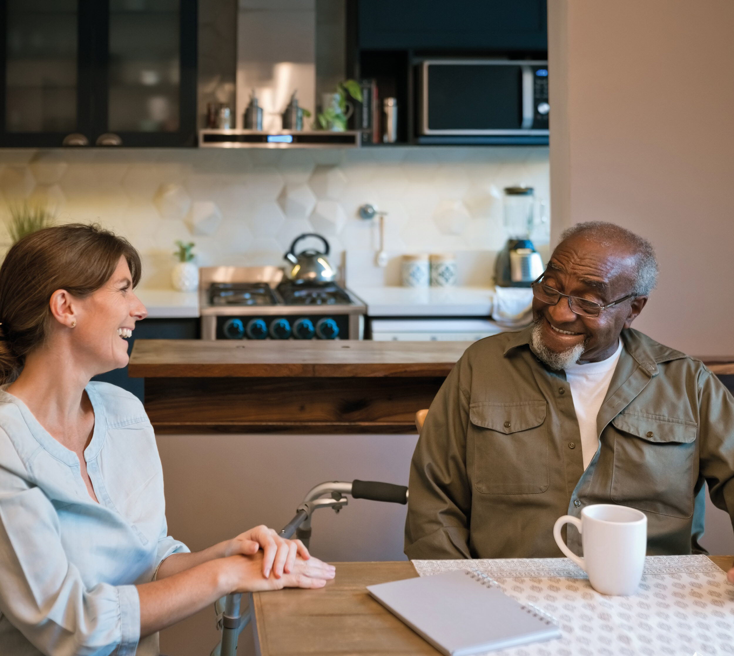 VA Carer images 2023 v6 Carer talking to elderly at home