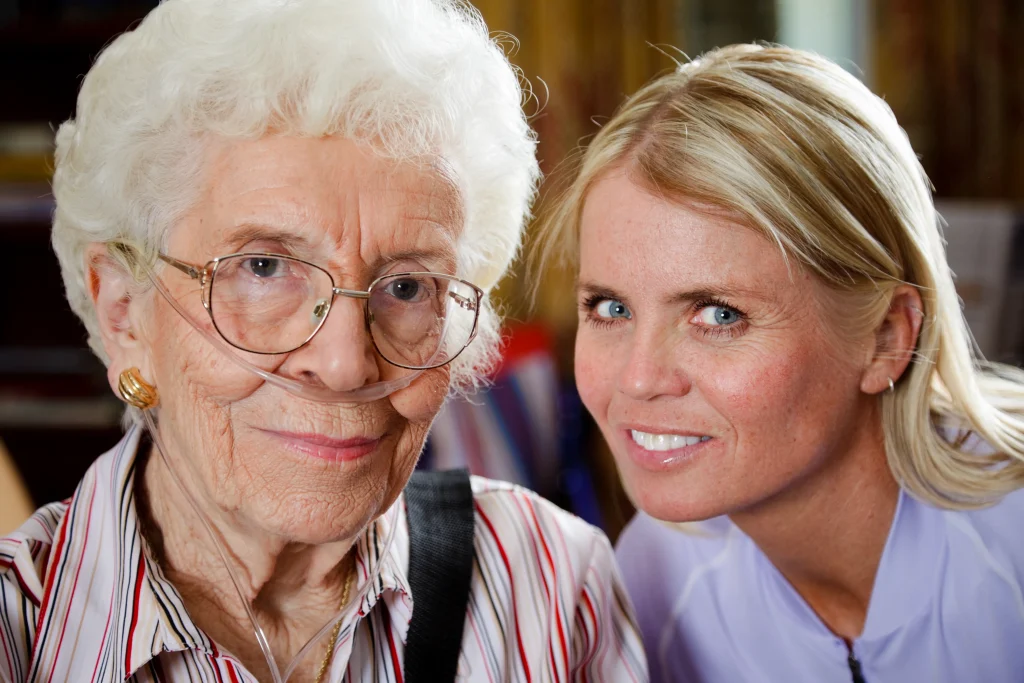 A Visiting Angels carer providing CQC rated home care to an elderly woman at home in Kidlington, Oxfordshire — compassionate, professional, trusted support