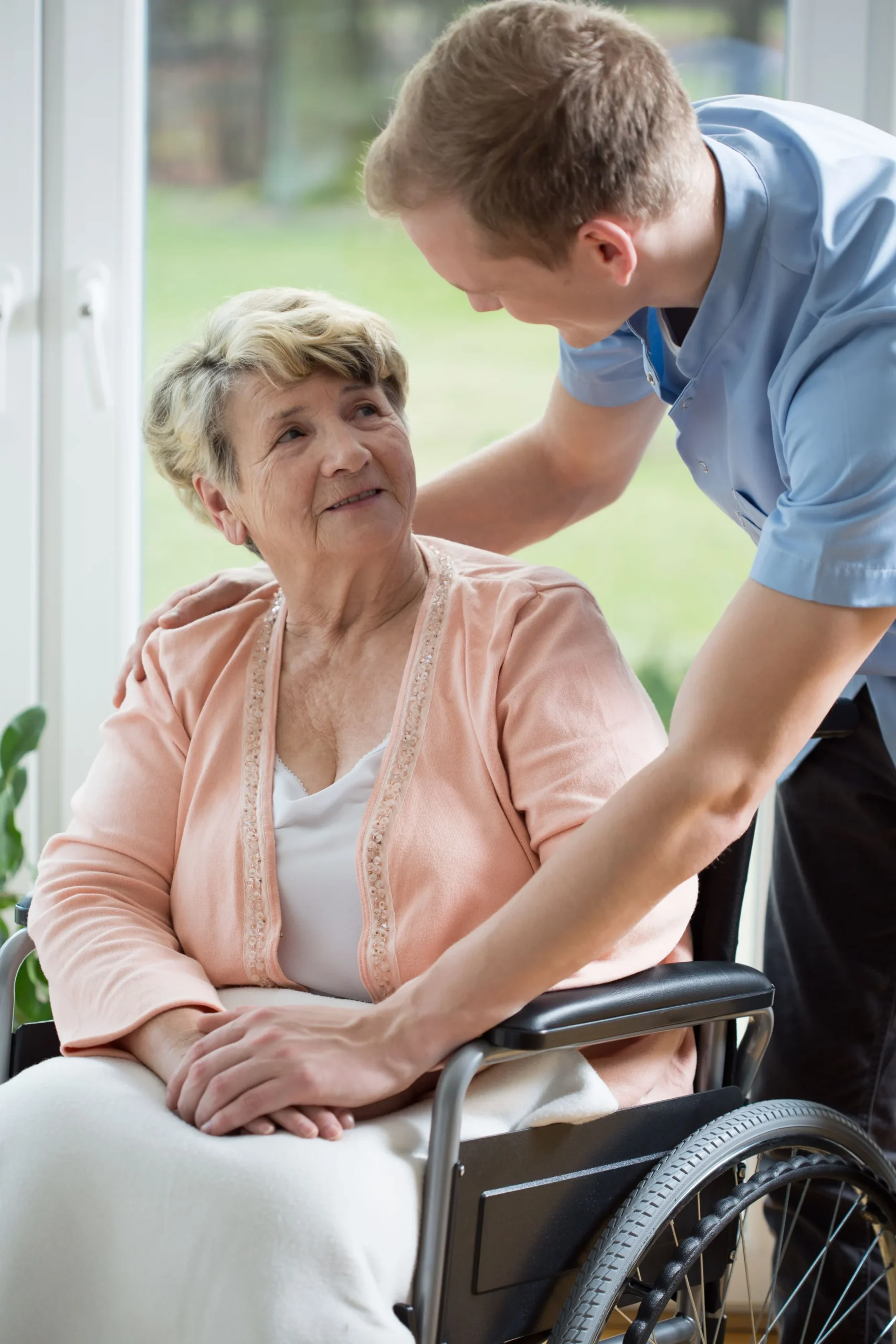 A Visiting Angels carer providing personal care and support to an elderly woman at home in Oxford, Oxfordshire — compassionate, professional, CQC rated home care