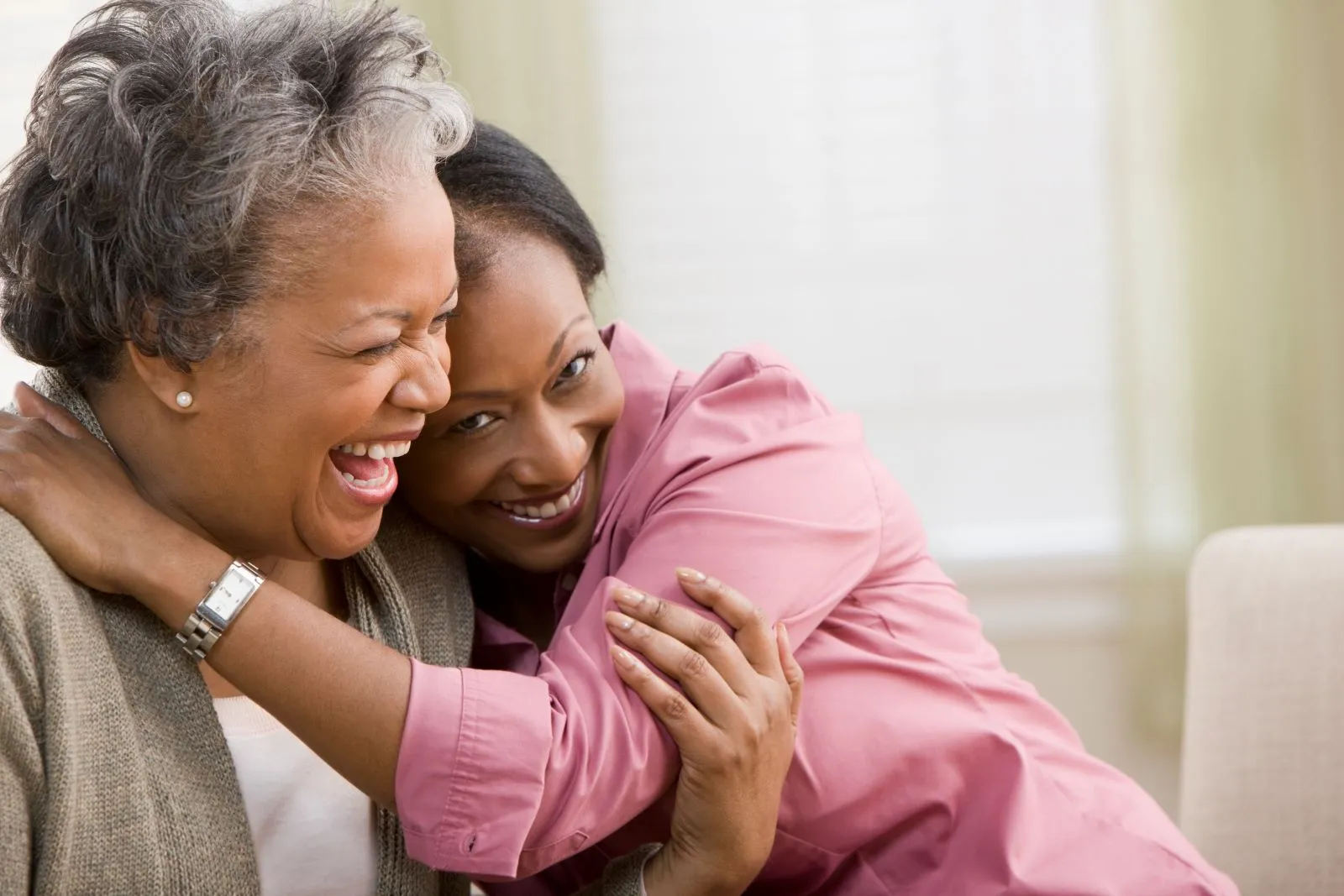 A Visiting Angels carer providing Alzheimer’s care services to an elderly woman at home in Headington, Oxfordshire — compassionate, professional, CQC rated home care