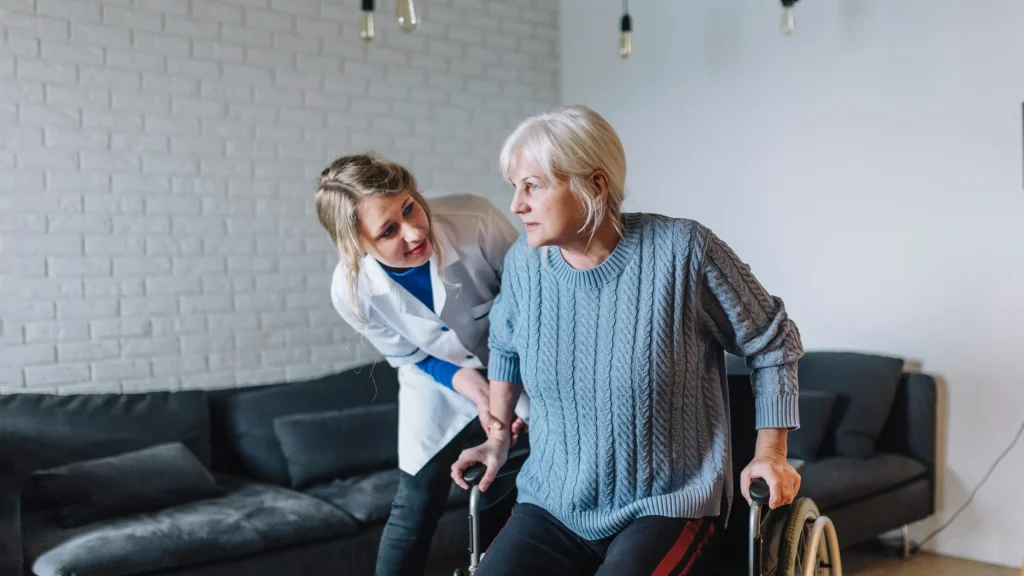 A Visiting Angels carer providing Alzheimer’s care to an elderly woman at home in Oxford, Oxfordshire — compassionate, professional, CQC Good rated home care