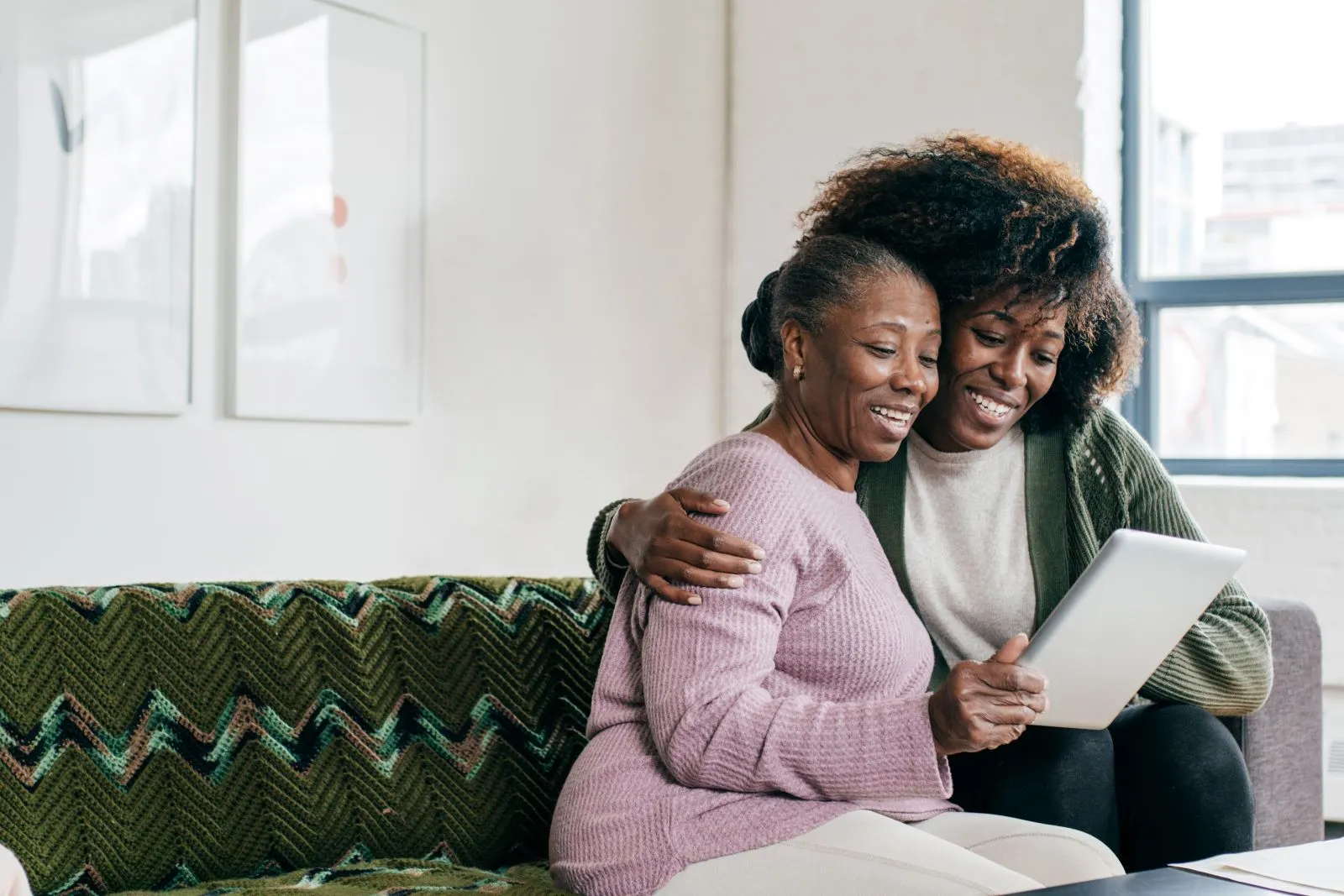 A Visiting Angels carer providing companionship care services to an elderly woman at home in Headington, Oxfordshire — compassionate, professional, CQC Good rated home care