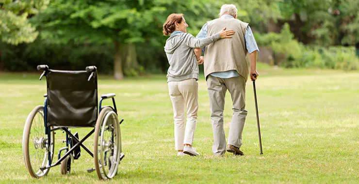 A Visiting Angels carer providing dementia care to an elderly man at home in Thame, Oxfordshire — compassionate, professional, CQC rated home care
