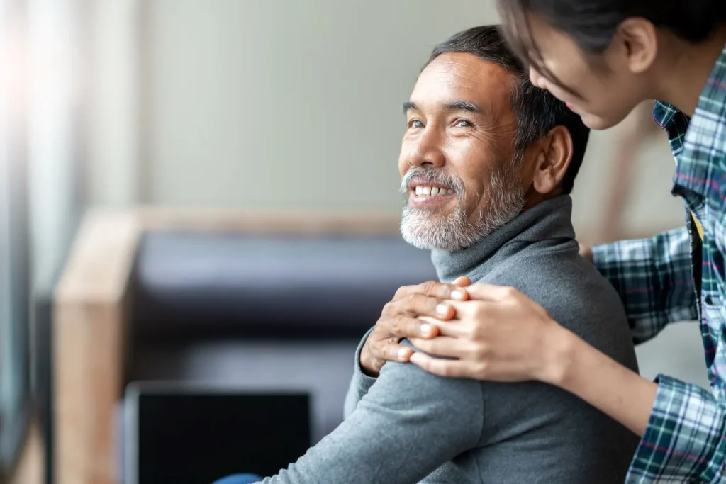 A Visiting Angels carer providing dementia care support to an elderly man at home in Oxford, Oxfordshire — compassionate, professional, CQC rated home care