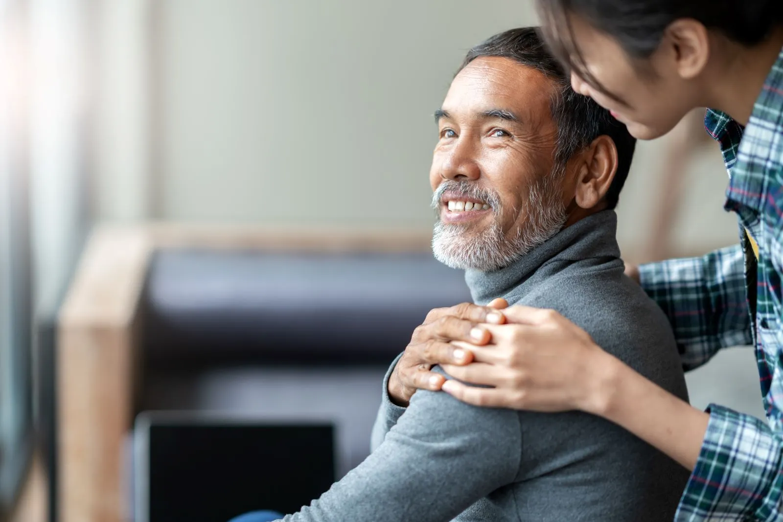 A Visiting Angels carer providing dementia care support to an elderly man at home in Oxford, Oxfordshire — compassionate, professional, CQC rated home care