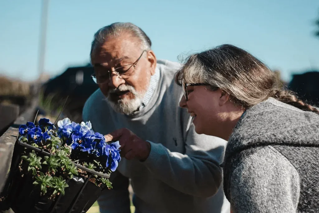 A Visiting Angels carer providing dementia care to an elderly couple at home in Wheatley, Oxfordshire — compassionate, professional, CQC Good rated home care