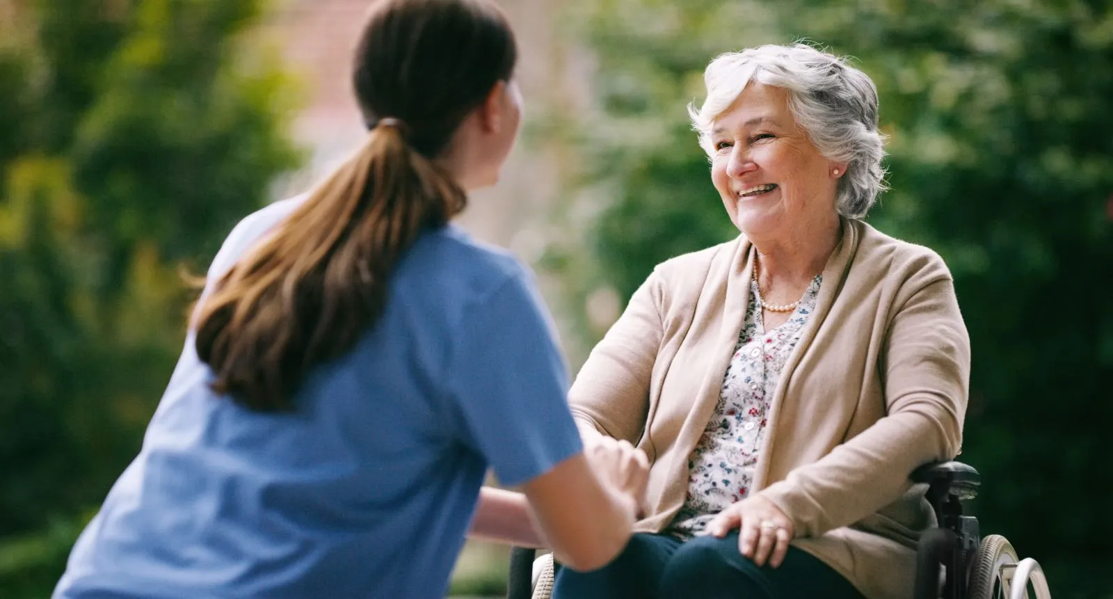 A Visiting Angels carer providing home care to an elderly woman at home in Abingdon, Oxfordshire — compassionate, professional, CQC Good rated home care