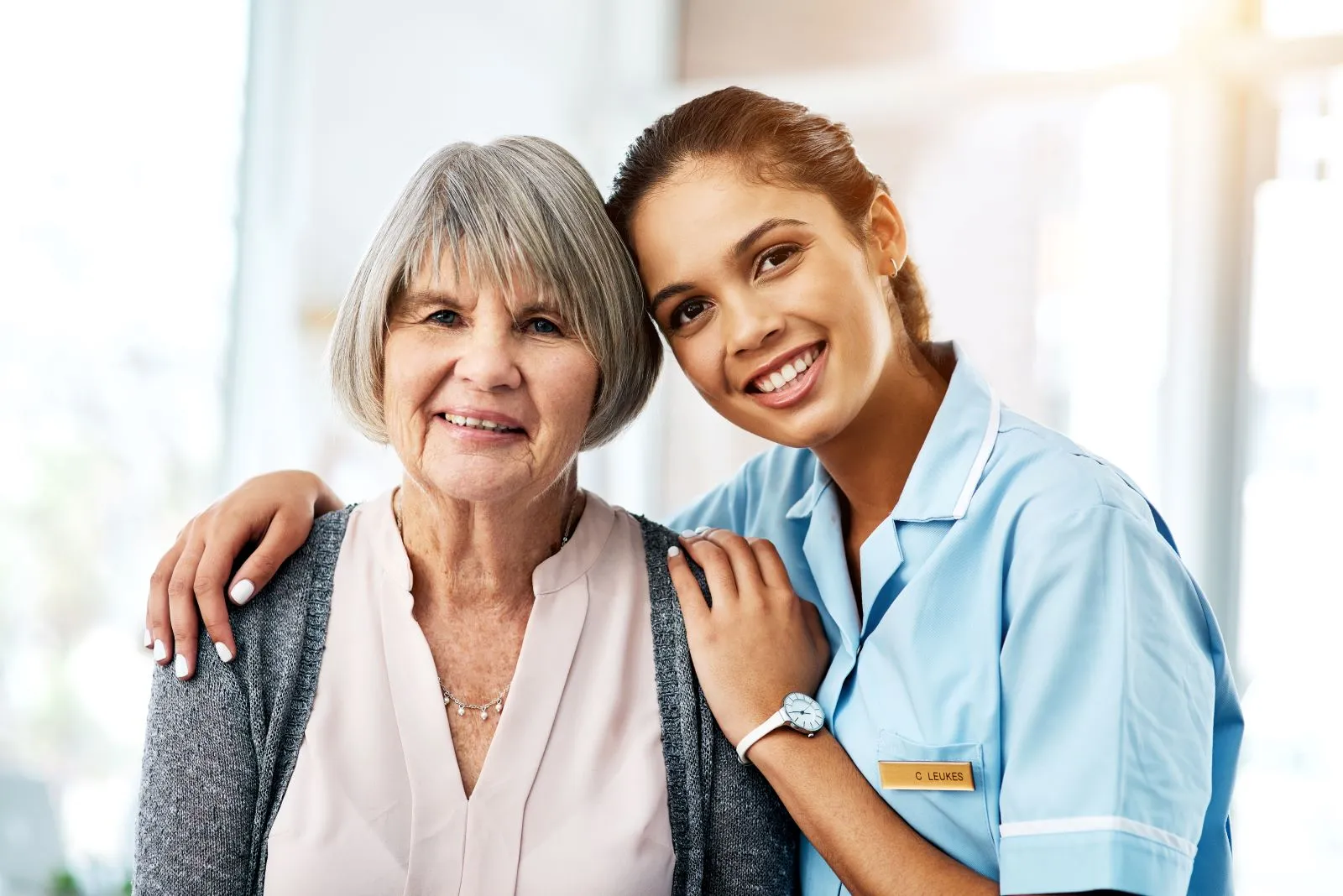 A Visiting Angels carer providing home care services to an elderly woman at home in Headington, Oxfordshire — compassionate, professional, CQC Good rated home care