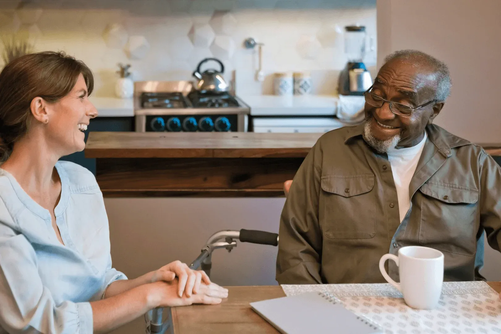 A Visiting Angels carer providing home care services to an elderly man at home in Kidlington, Oxfordshire — compassionate, professional, CQC rated home care