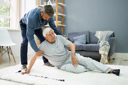A Visiting Angels carer providing home help for elderly to an older man at home in Abingdon, Oxfordshire — compassionate, professional, CQC rated home care