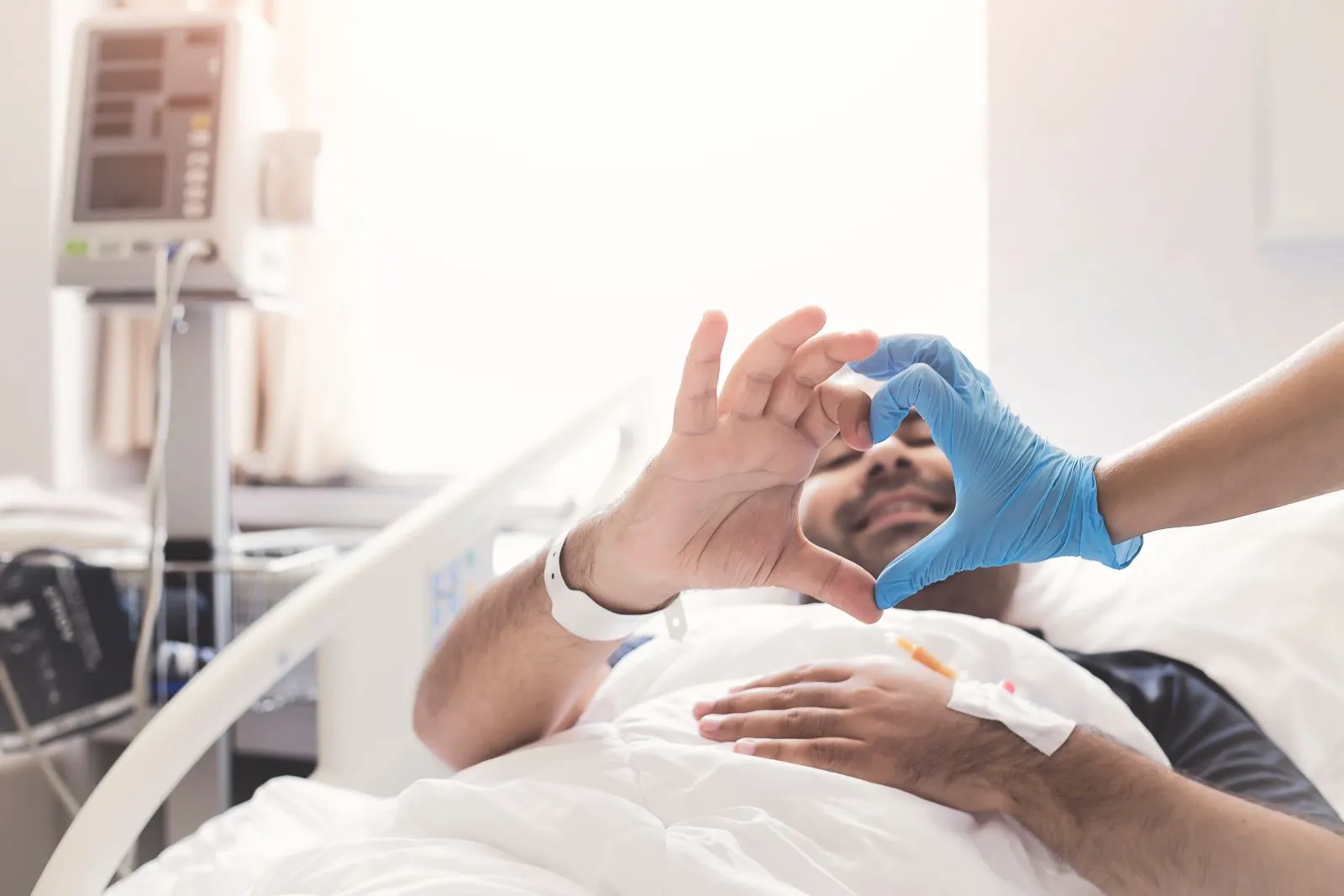 A Visiting Angels carer providing post hospital discharge care to an elderly man in Oxford, Oxfordshire — compassionate, professional, CQC rated home care