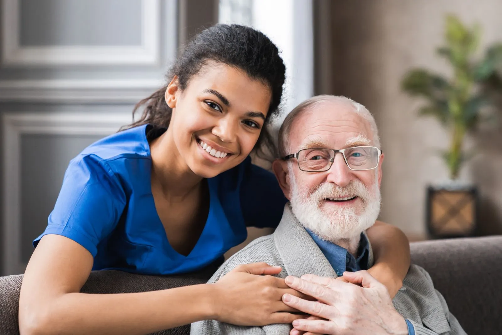A Visiting Angels carer providing live‑in care to an elderly man at home in Kidlington, Oxfordshire — compassionate, professional, CQC Good rated home care