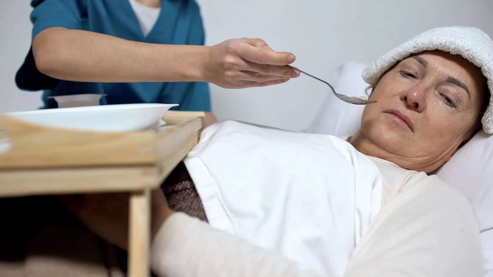 A Visiting Angels carer providing live‑in care services to an elderly woman at home in Oxford, Oxfordshire — compassionate, professional, CQC Good rated home care