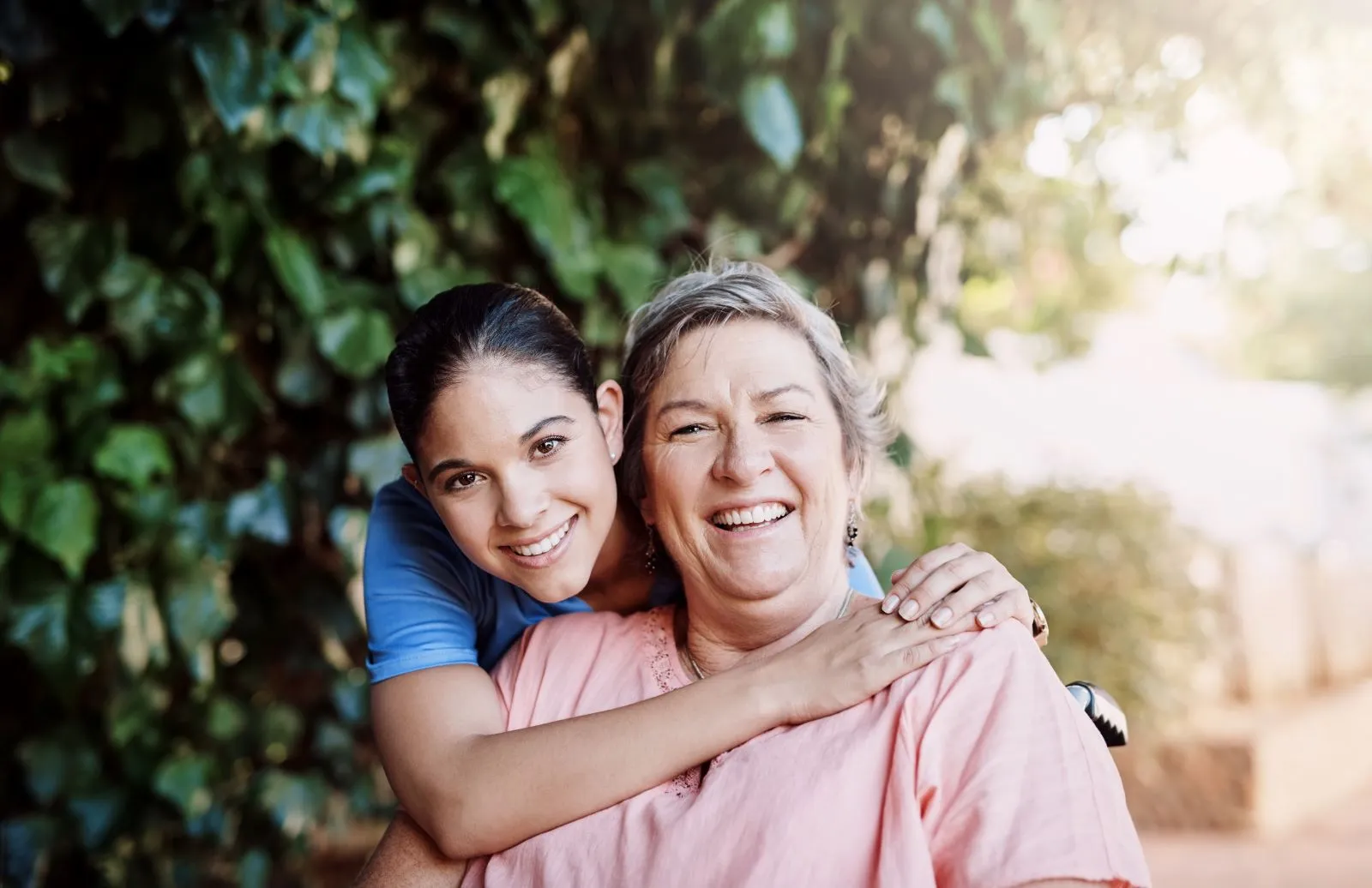 A Visiting Angels carer providing supporting elderly Oxford care to an older woman at home in Oxfordshire — compassionate, professional, CQC rated home care