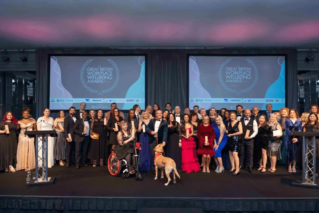 A Visiting Angels team celebrating the Workplace Wellbeing Award in Oxfordshire — compassionate, professional, CQC rated home care agency