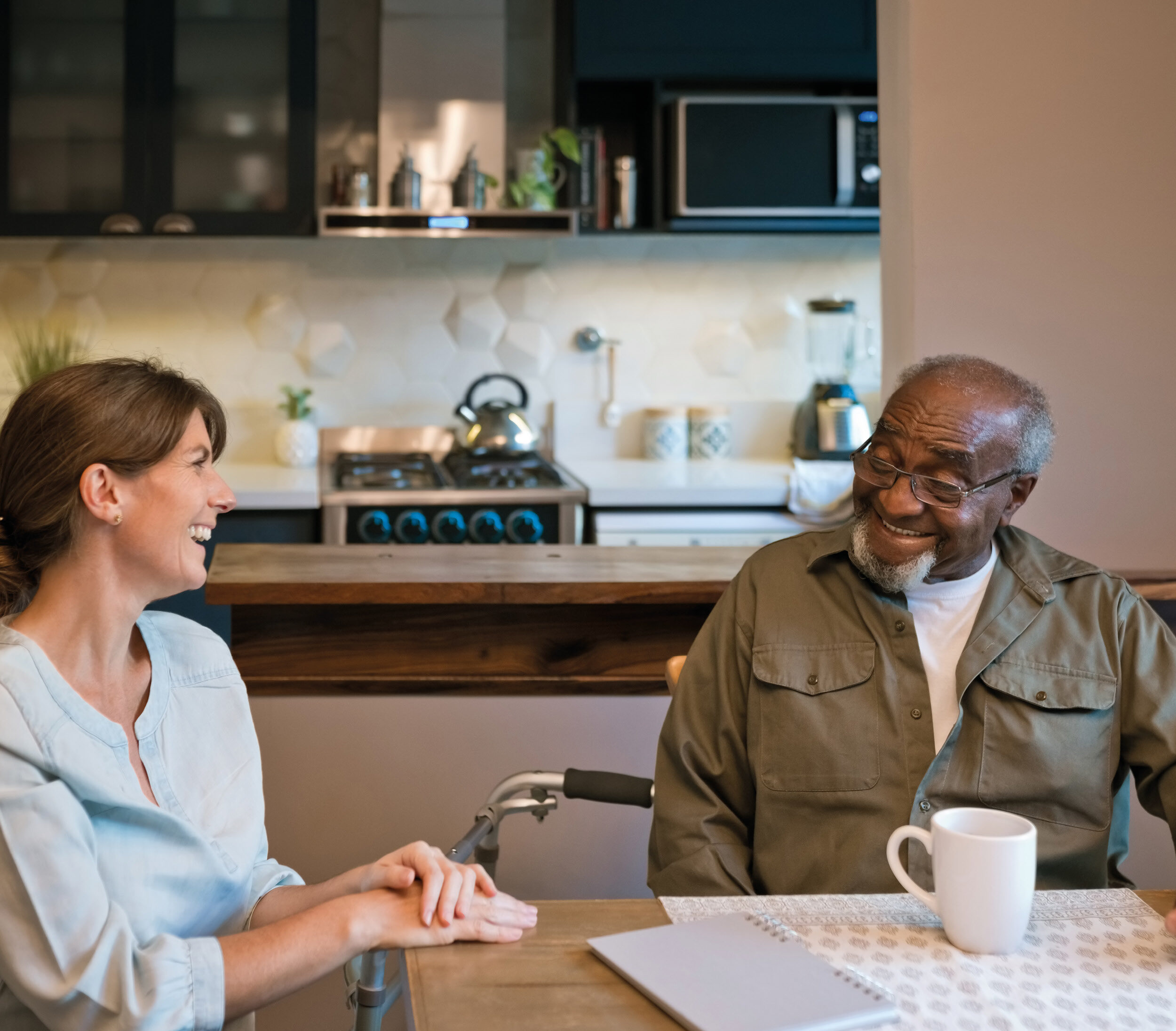 VA Carer images 2023 v6 Carer talking to elderly at home